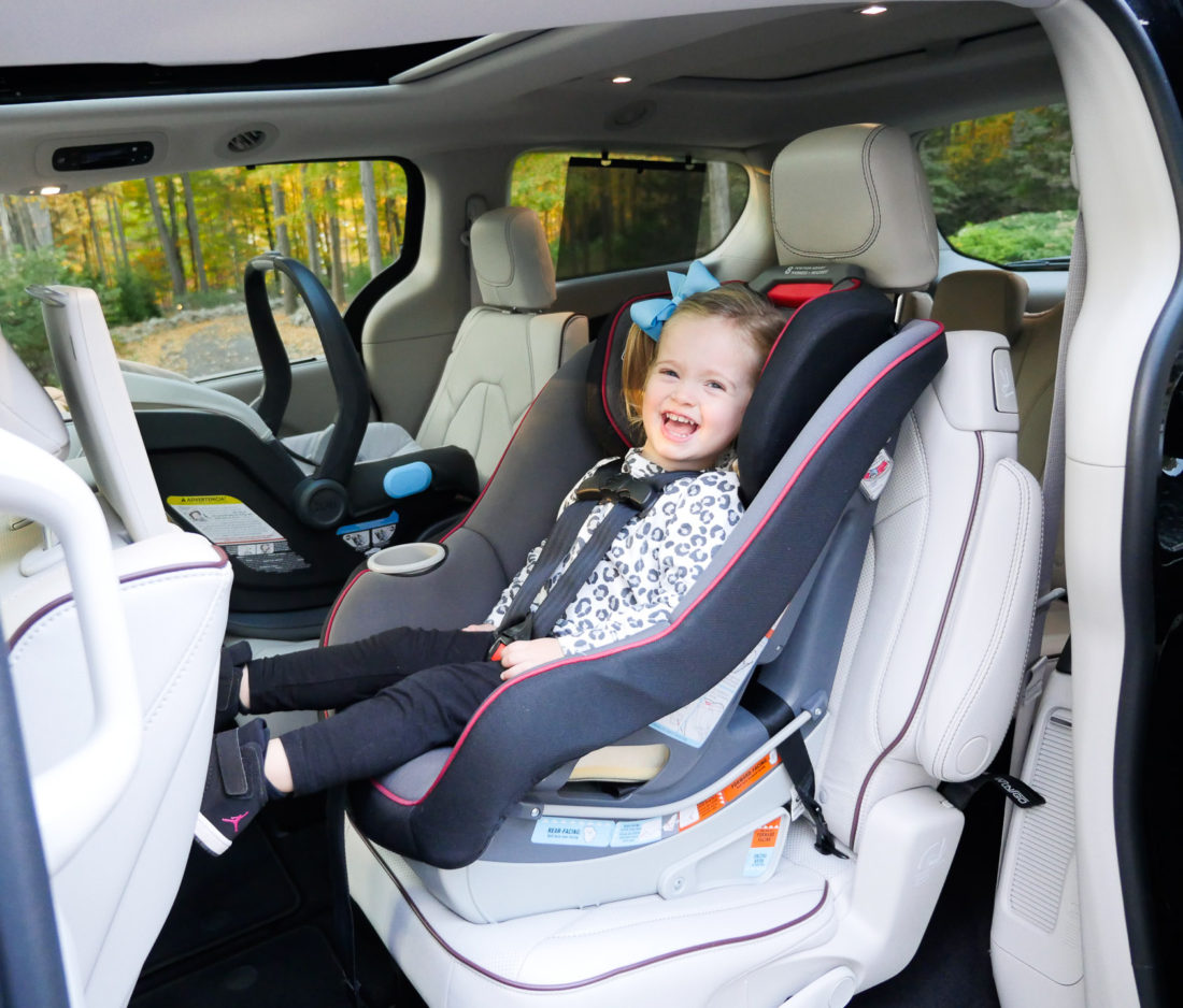 Marlowe Martino pictured sitting in a black chrysler pacifica