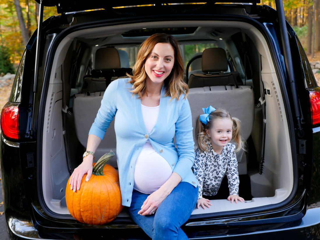Brenda Mierish Martino and Marlowe Martino pictured sitting in the trunk of the chrysler pacifica