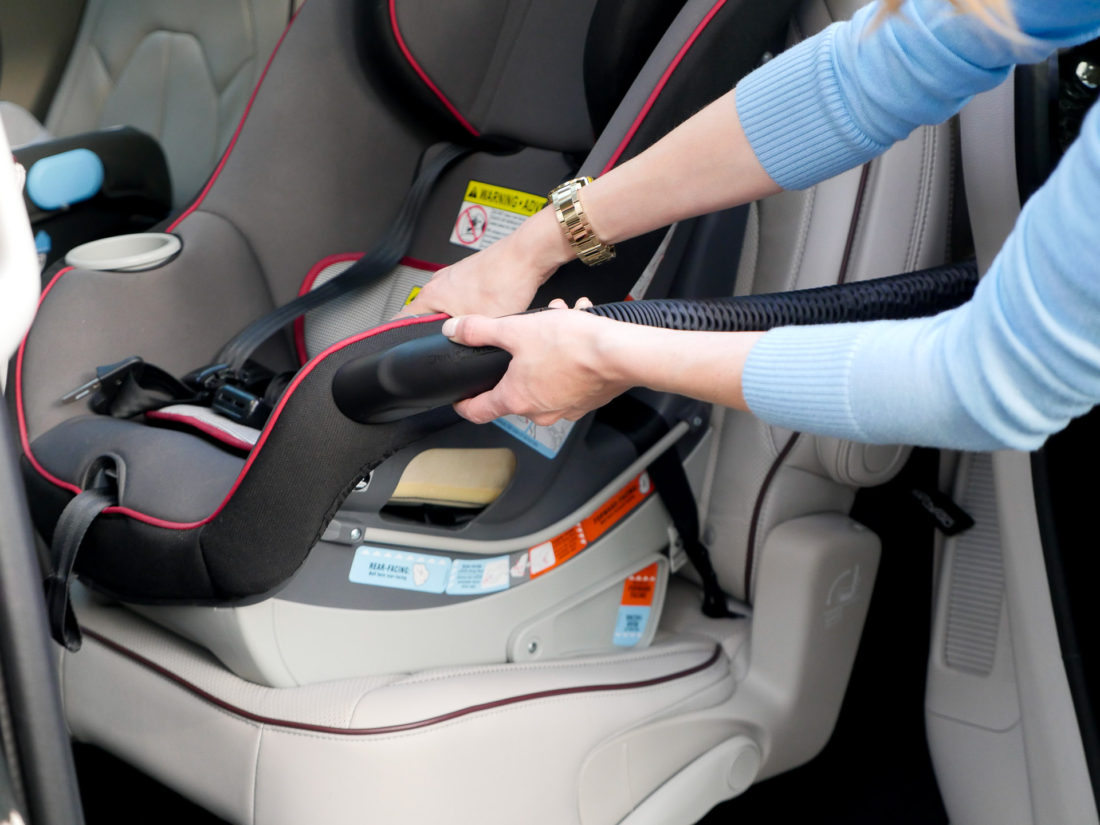 Brenda Mierish Martino pictured using the attached vacuum feature on her new chrysler pacifica