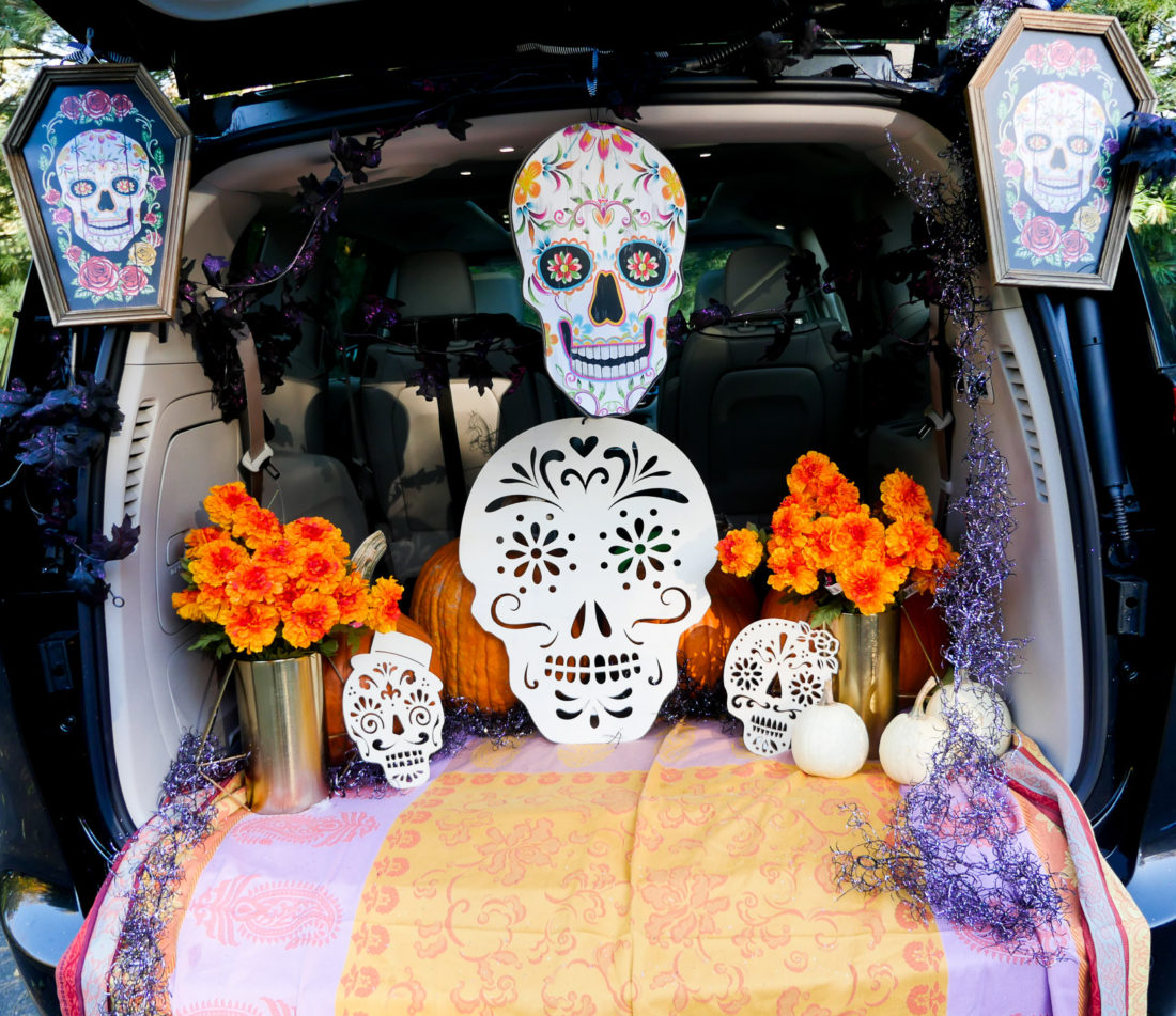 Brenda Mierish Martino's decorated trunk for the Trunk-or-Treat party at her daughter's school featuring a Day Of The Dead theme