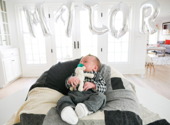 Lifestyle and Motherhood blogger Brenda Mierish Martino's newborn son, Major James, is pictured in the foreground with a balloon sign spelling out his name at the Sip And See party in his honor at her connecticut home