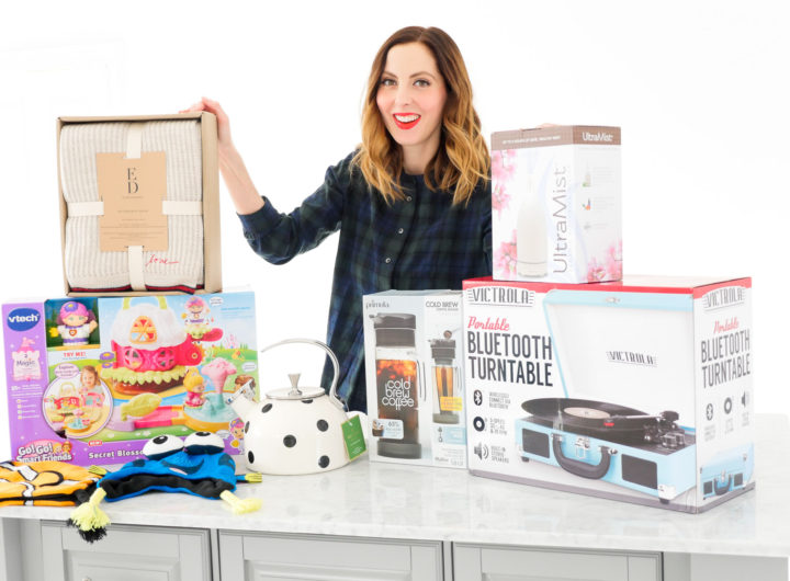 Brenda Mierish Martino poses with an array of holiday gifts for friends and family
