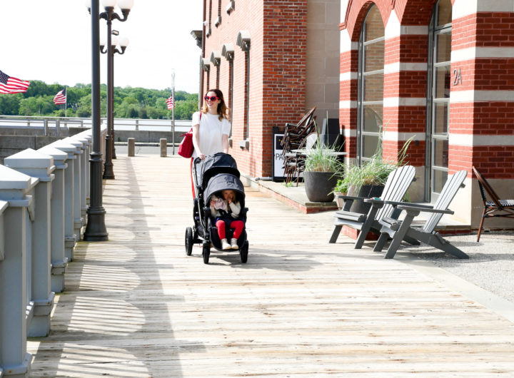 Brenda Mierish Martino walks with her two children in a Baby Jogger Stroller down the street in downtown Westport