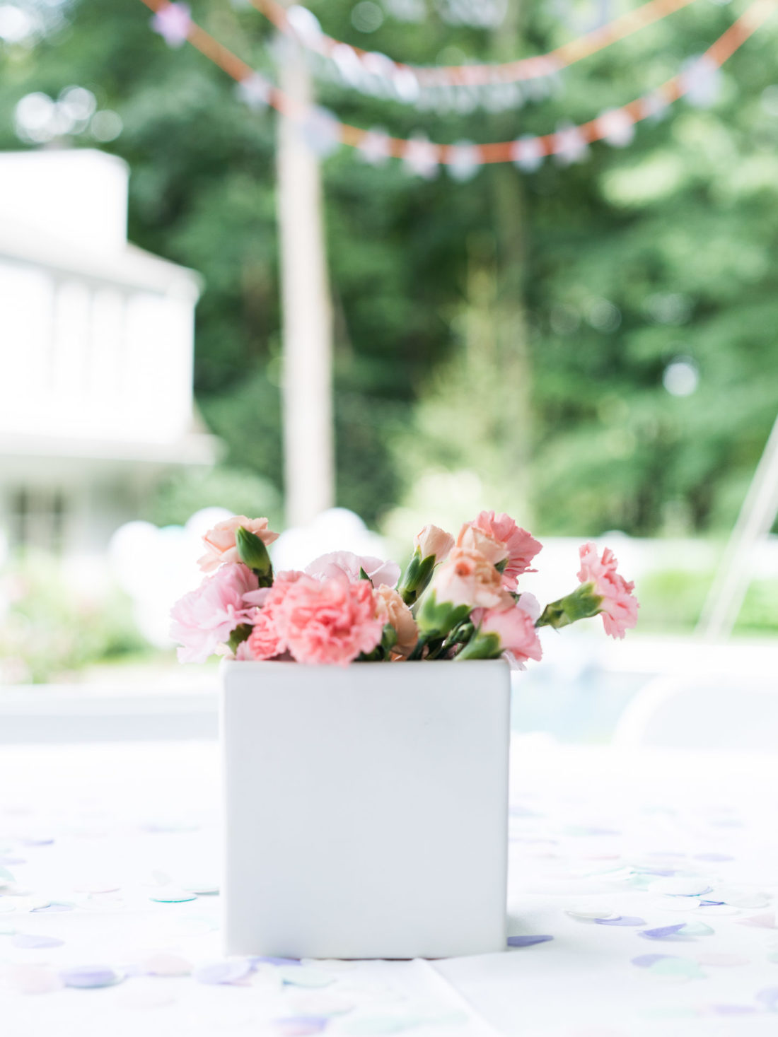 Brenda Mierish Martino decorates the backyard of her Connecticut home for daughter Marlowe's 3rd birthday party with a Sharks vs. Mermaids theme