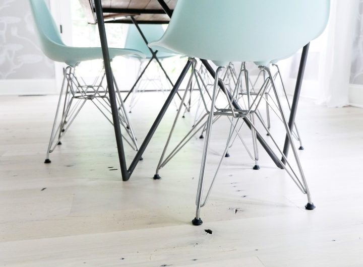 robin's egg blue molded plastic eames chairs in the dining room of Brenda Mierish Martino's Connecticut home