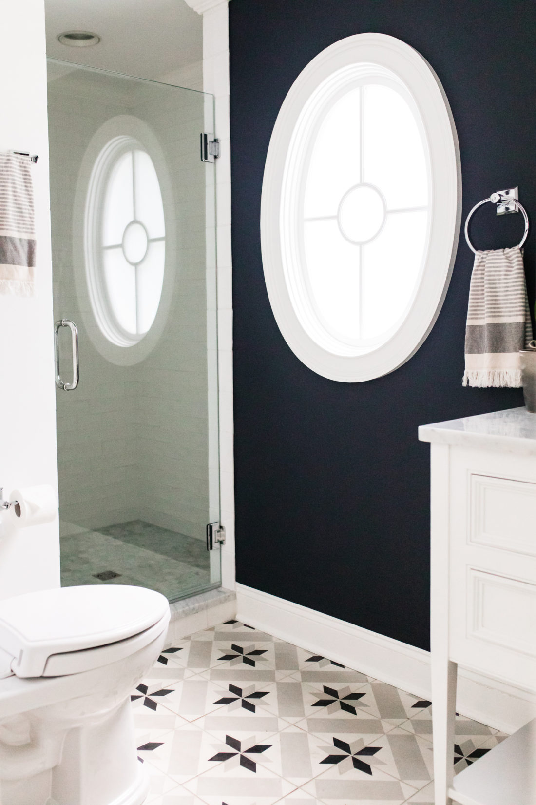 Brenda Mierish Martino shares the full redesign of her black, white, and grey concept powder room in her Connecticut home