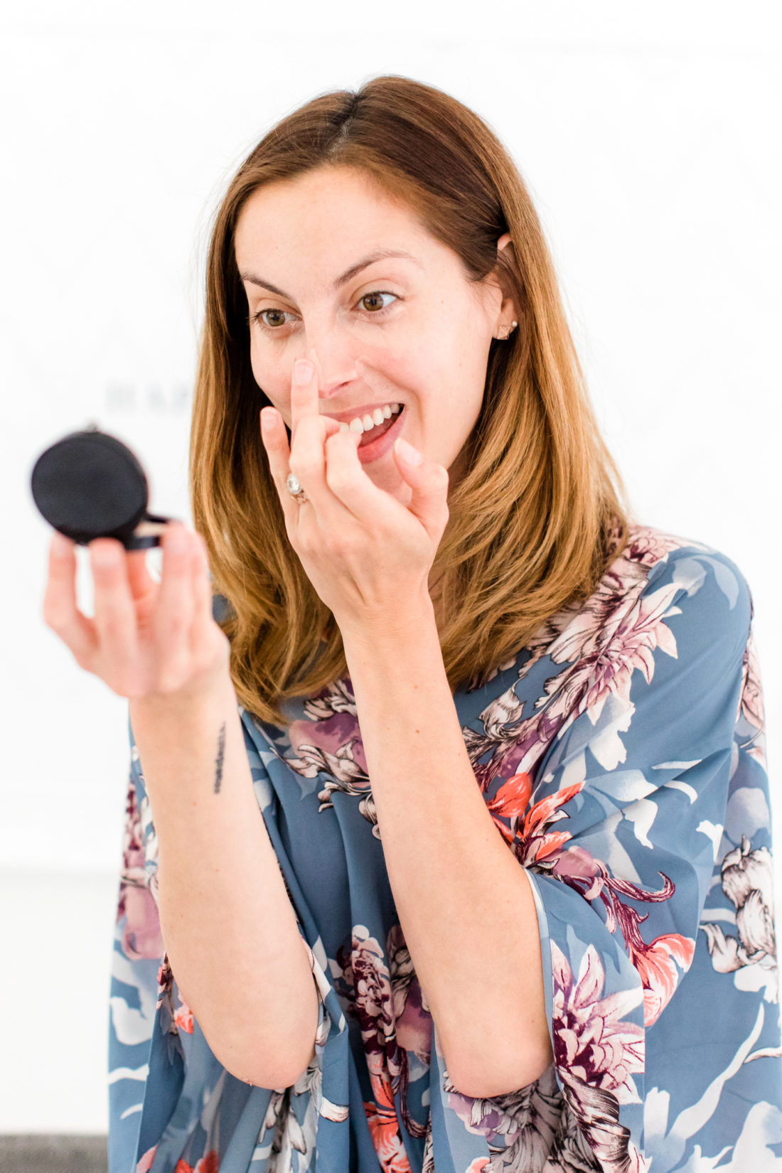 Brenda Mierish Martino applies concealer as part of her photo shoot makeup tutorial