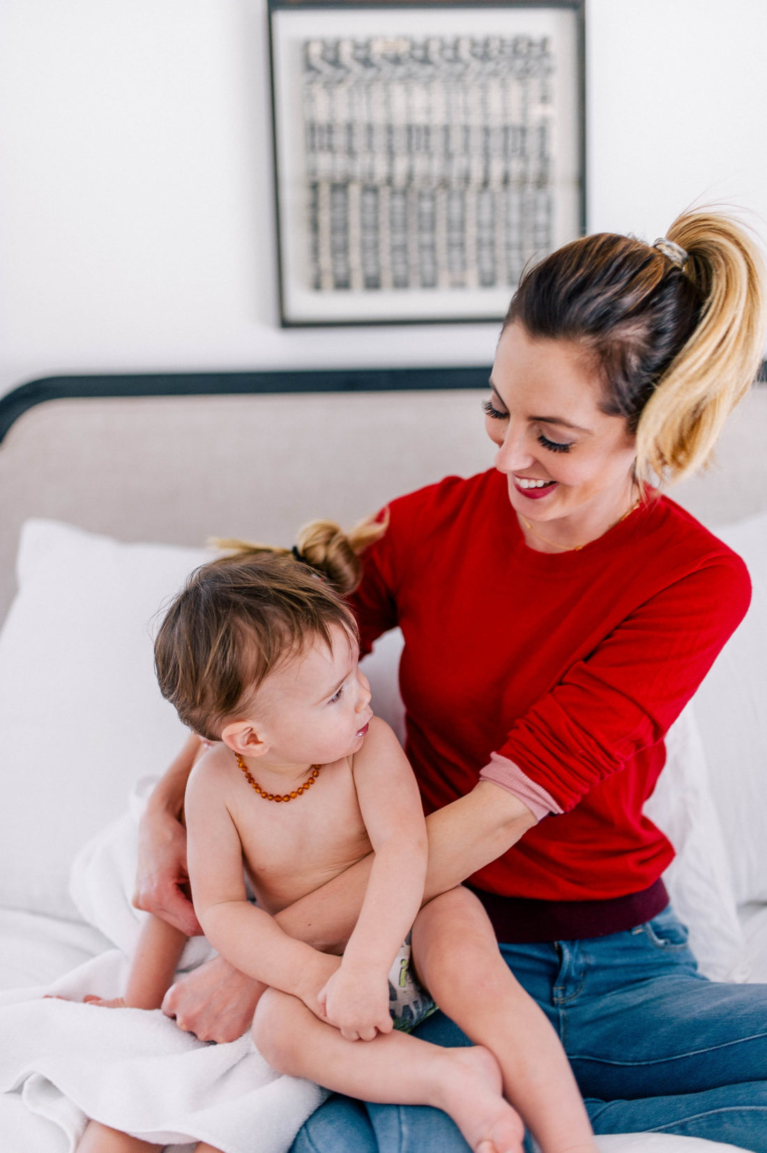Brenda Mierish Martino holds son, Major, on her lap as she gets him ready for bed