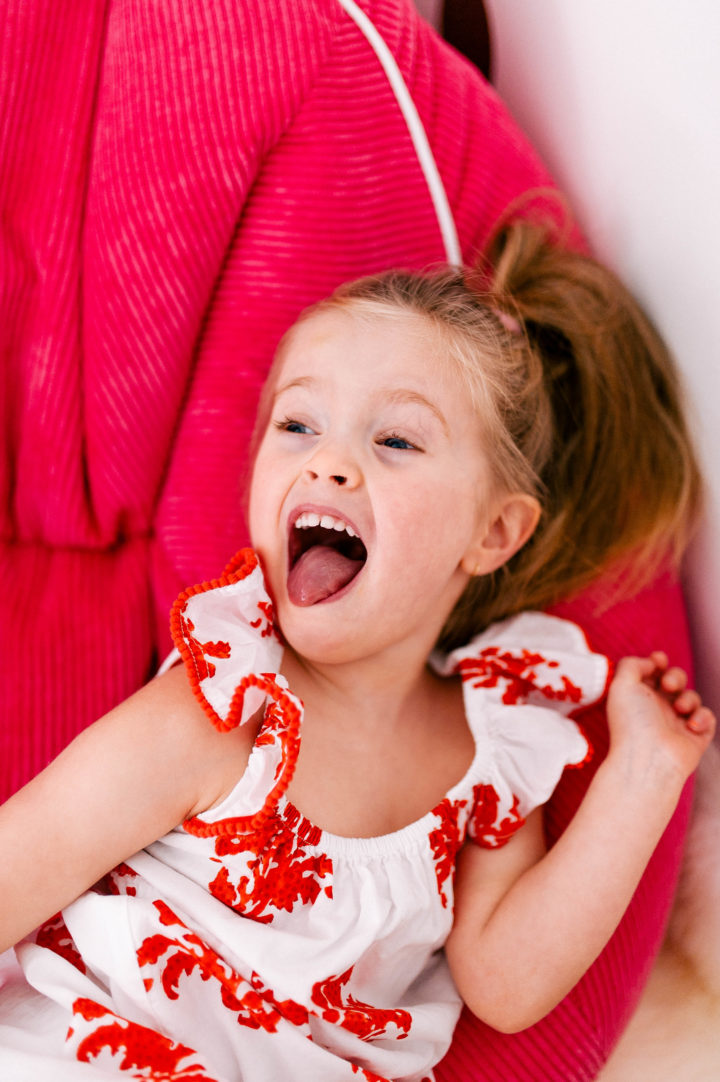 Brenda Mierish Martino's daughter Marlowe makes a silly face on a colorful bean bag chair