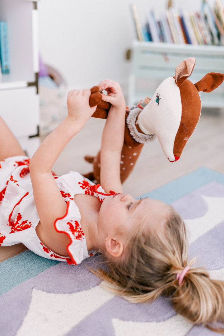 Brenda Mierish Martino's daughter Marlowe lies on the floor of her bedroom in Connecticut