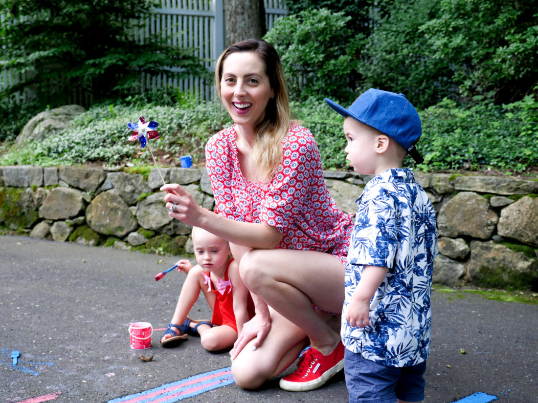 Brenda Mierish Martino decorates her driveway for the fourth of july with her children Marlowe and Major