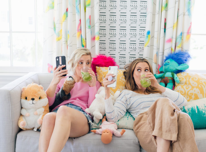 Brenda Mierish Martino of Happily Brenda After and Julia Dzafic of Lemon Stripes sit on a couch in the Martino house drinking Margaritas and reminiscing on their parenting style